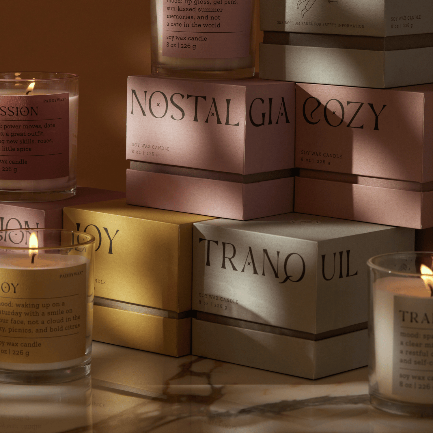Mood Collection Candles and decorative boxes in deep, almost-unseeable shadow