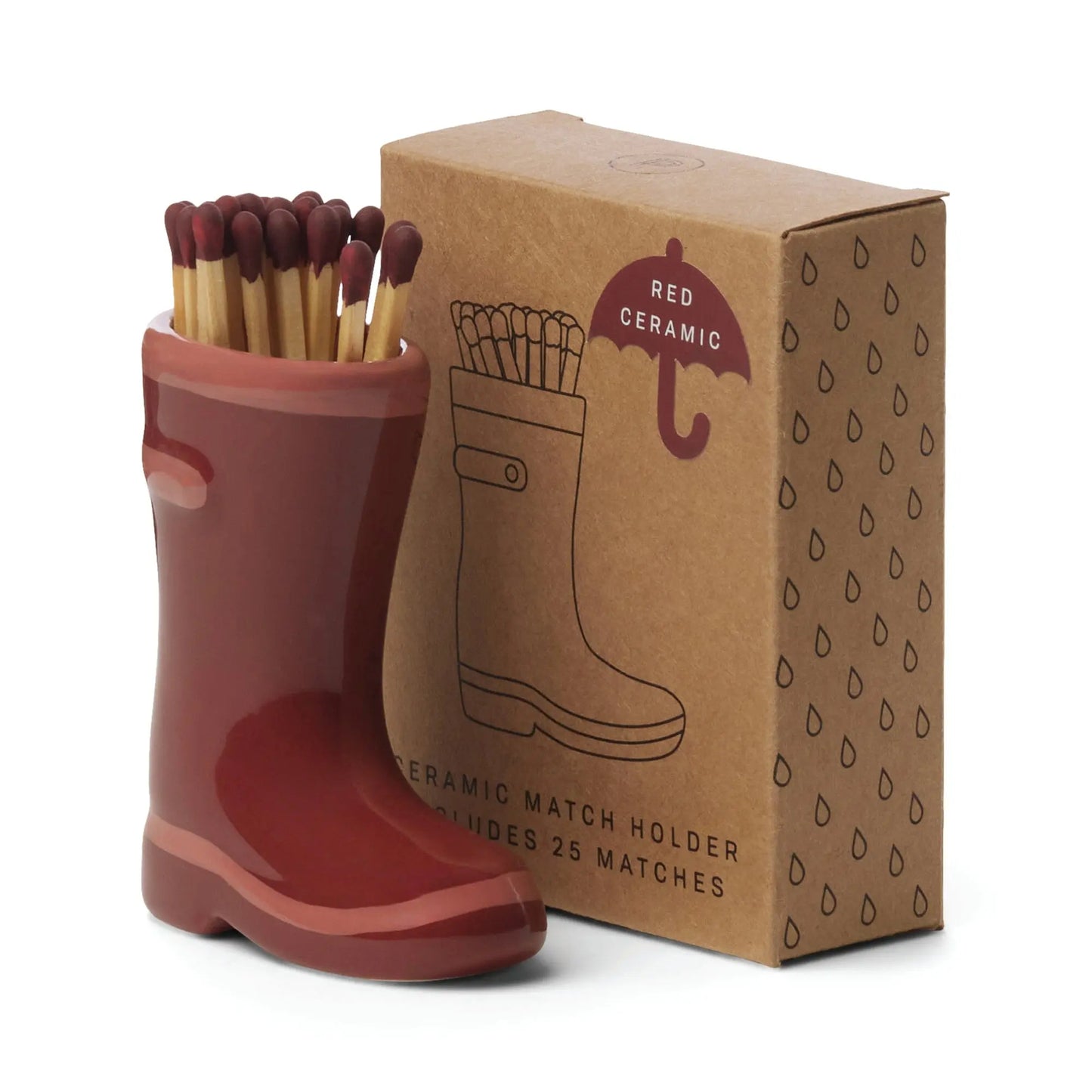 The Wellington Boot Matches - Dark Red features a red ceramic boot match holder filled with matches, displayed beside its illustrated brown cardboard box—a charming home decor gift.