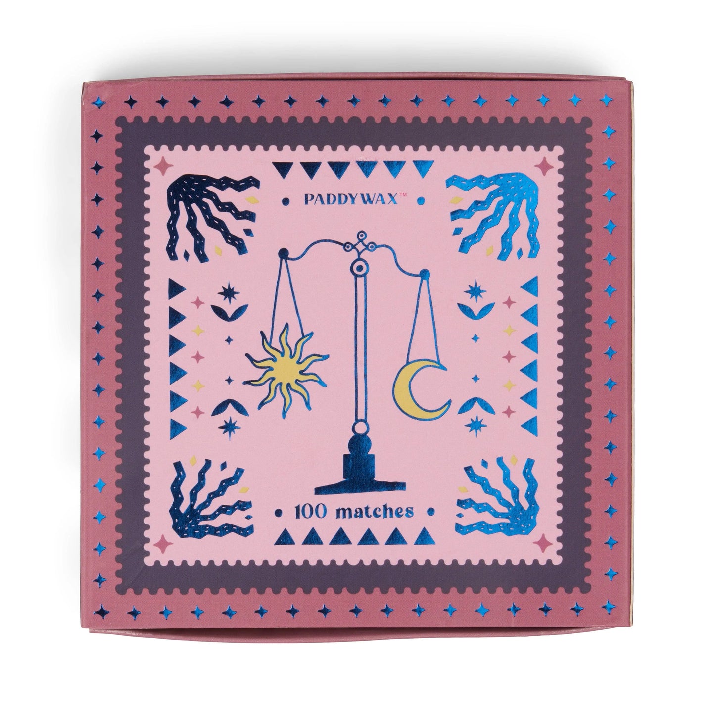 The Jumbo Boxed Matches - Balance is a pink matchbox of Paddywax jumbo matches featuring a balance scale illustration with a sun and crescent moon, surrounded by stars and decorative designs.