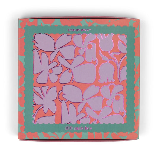 The Jumbo Boxed Matches - Abstract Floral features a square box with a purple and pink floral design, green and pink borders, and contains 100 matches—ideal for lighting your favorite Paddywax candle.
