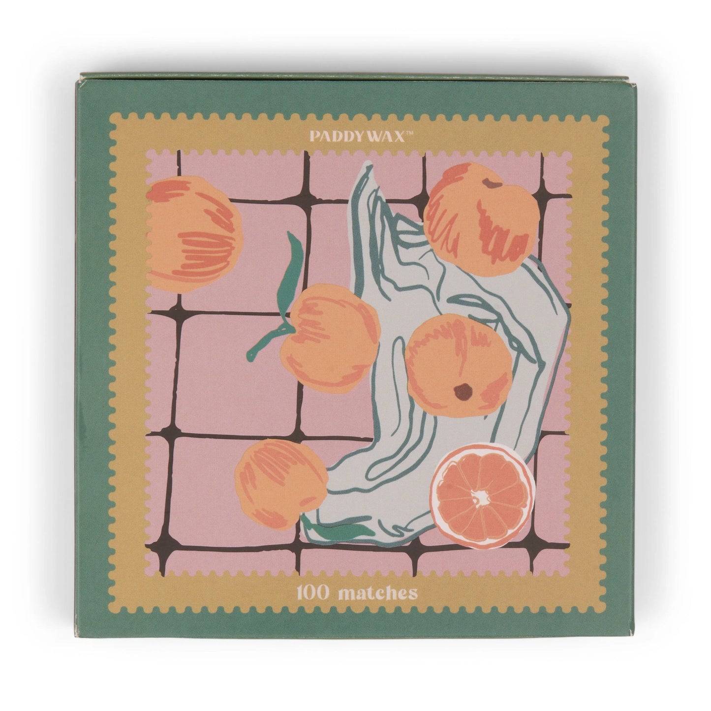 The Jumbo Boxed Matches - Oranges by Paddywax feature an illustrated design with peaches, a sliced orange, and a blue cloth on a pink tiled background—perfect for lighting your favorite candle.