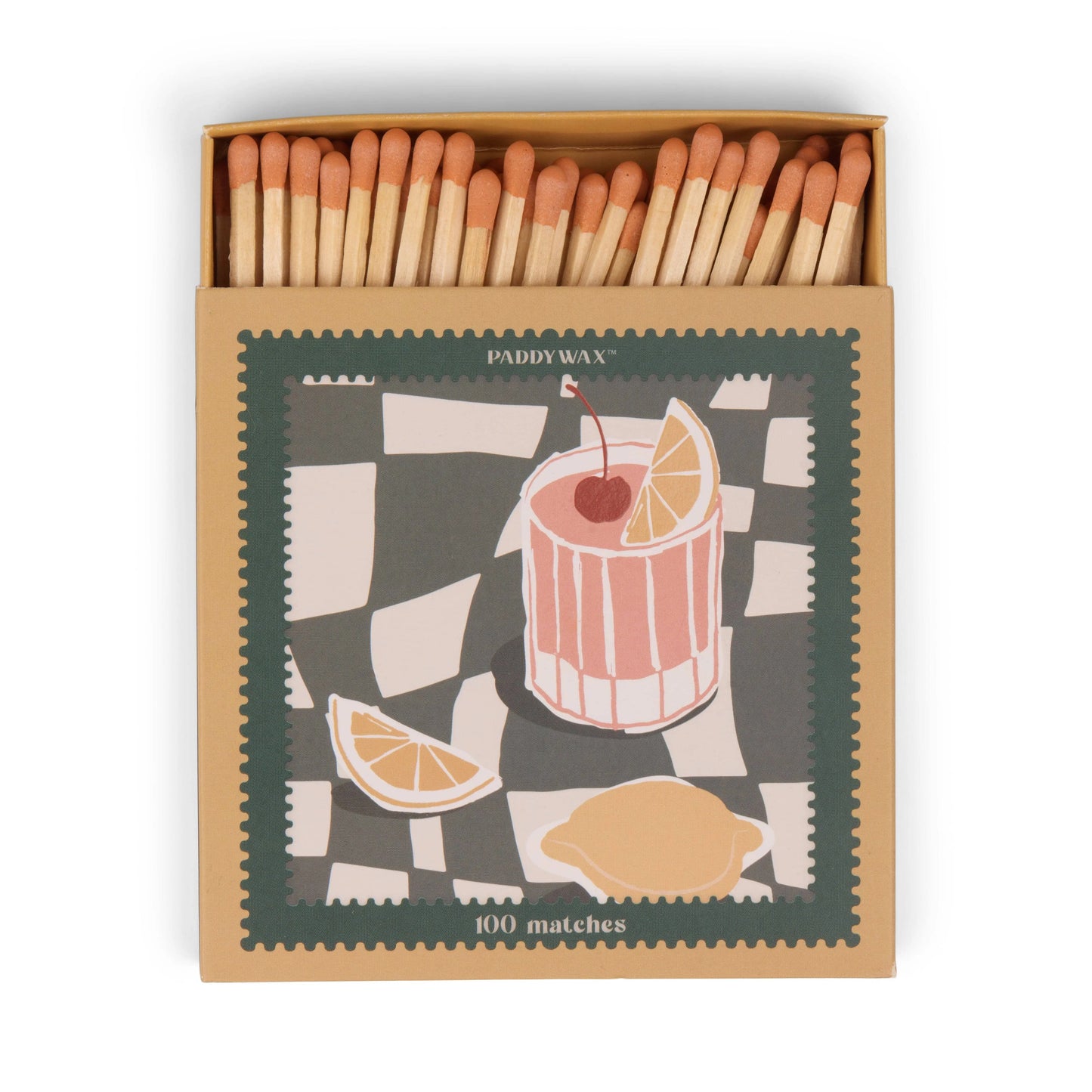 The Jumbo Boxed Matches - Cocktail features jumbo matches in a decorative matchbox with a pink drink, cherry, and lemon design on a checkered background—perfect for lighting your favorite candle.