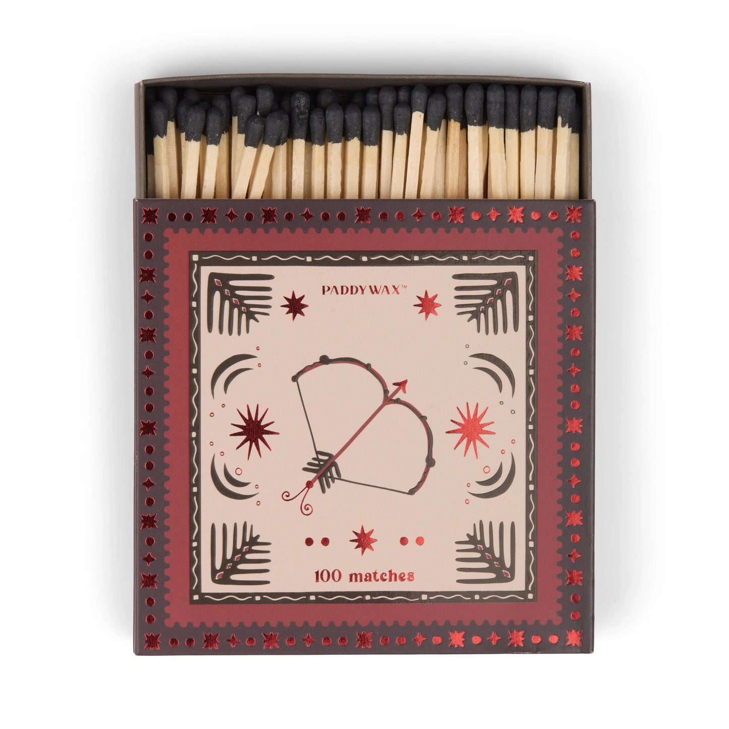 The Jumbo Boxed Matches - Bow & Arrow features 100 black-tipped matches in a decorative box with a bow and arrow design and star patterns—perfect for lighting your favorite Paddywax candle.