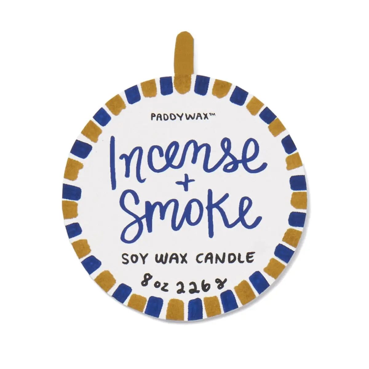 Round label for the A Dopo Eye Candle - Incense & Smoke, featuring blue and gold borders, bold fragrance notes, hand-painted details, and weight indicated as 8 oz (226 g).