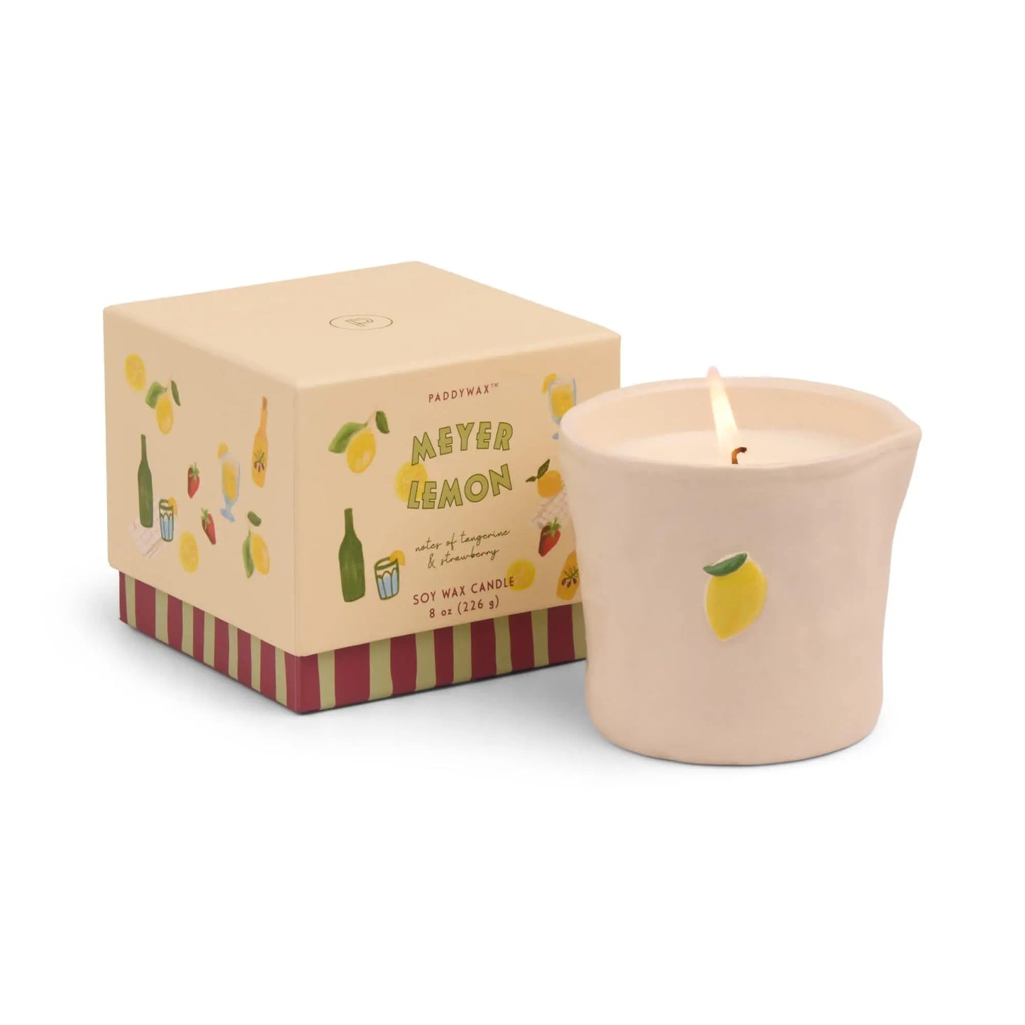 The Bistro Candle - Meyer Lemon from the Bistro Collection sits in a cream ceramic container with a lemon illustration, next to a matching box with fruit and bottle designs. Ideal for Ceramic Candle enthusiasts.