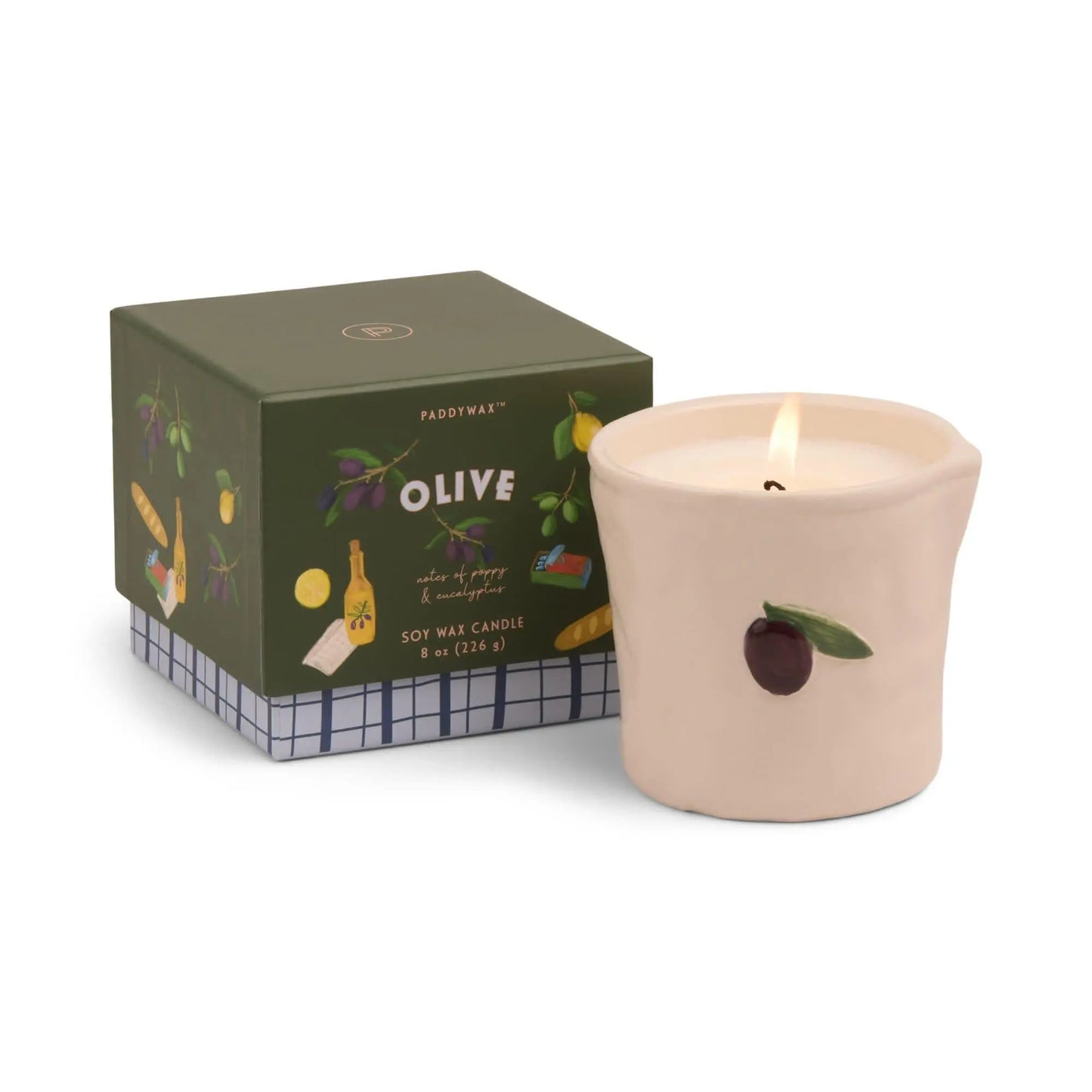 The Bistro Candle - Fig & Olive features a lit soy wax candle in a cream container with an olive design beside a green Olive-labeled box, bringing Parisian café charm and culinary-inspired fragrance to your space.