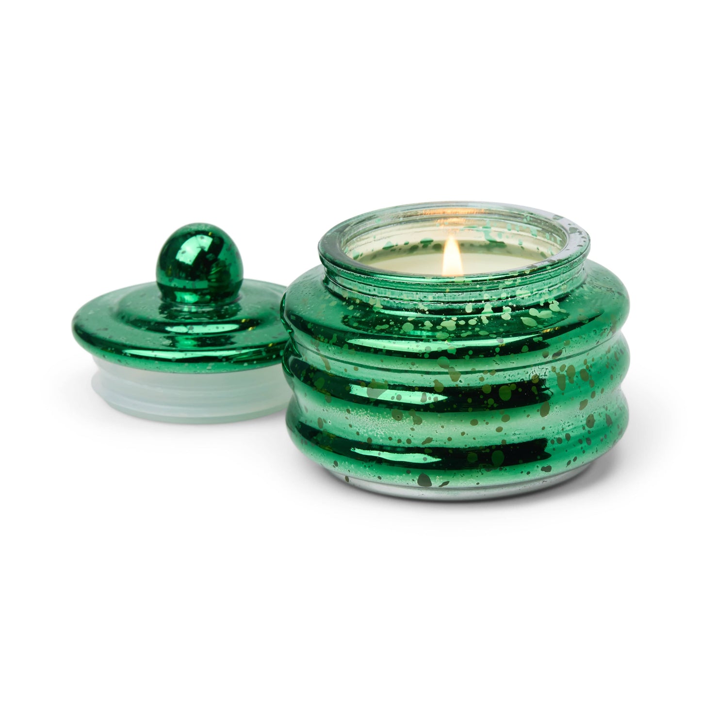 The Balsam & Fir - Beam 3 oz Candle sits in a shiny green speckled glass jar with a matching round lid—an ideal holiday gift or Christmas party favor.
