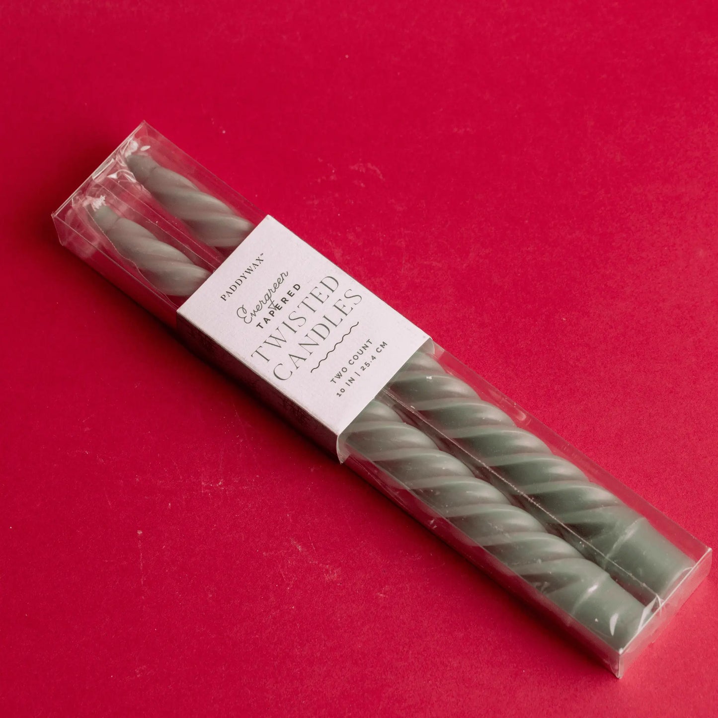 Evergreen Twisted Taper Candles 2-count in box on red table