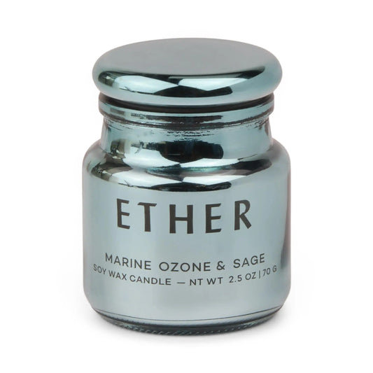 A metallic blue electroplated glass jar labeled ETHER holds the Chroma Candle - Sea Salt & Sage, a soy wax candle with marine ozone and sage scent, net weight 2.5 oz (70 g).