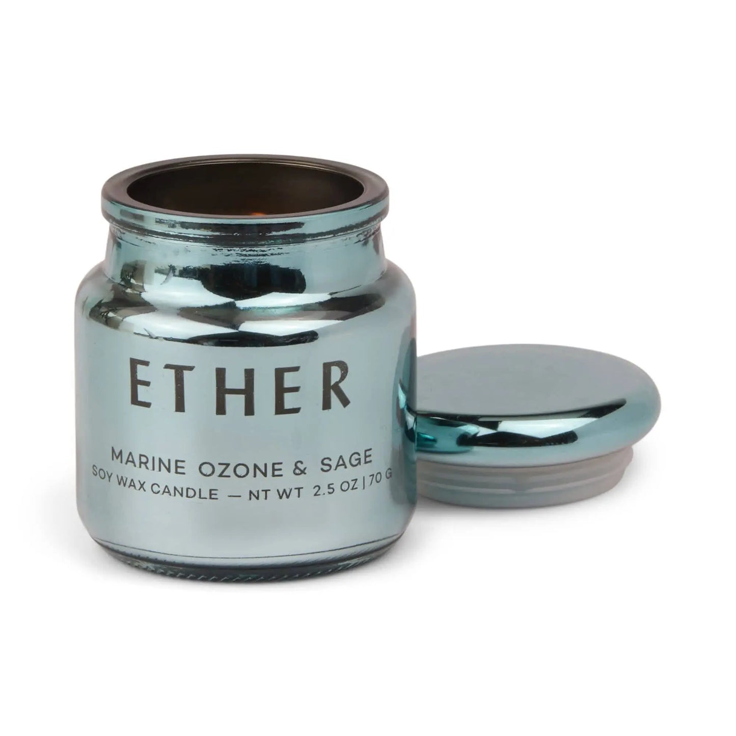 A blue electroplated glass jar labeled Chroma Candle - Sea Salt & Sage, part of the Chroma Collection, with its lid beside it on a white background.