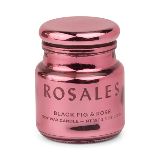 A small, metallic pink electroplated glass jar labeled Chroma Candle - Saffron Rose — NT WT 2.5 OZ / 70 G from the Chroma collection for a unique scent experience.