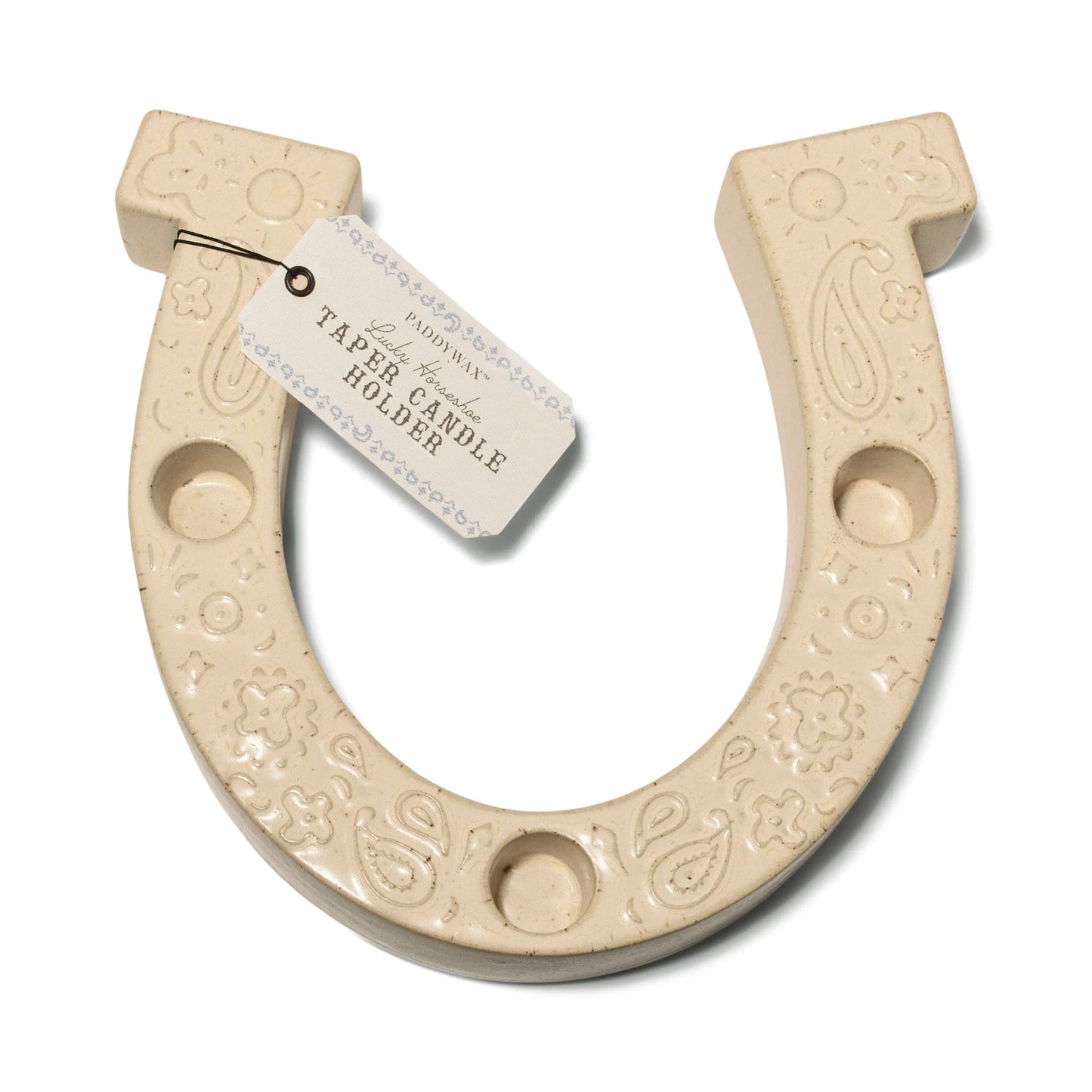 The Nashville White Ceramic Horseshoe Taper Holder w/ Hangtag features decorative patterns and a tag labeled TABLE CANDLE HOLDER, adding charm to your home decor.