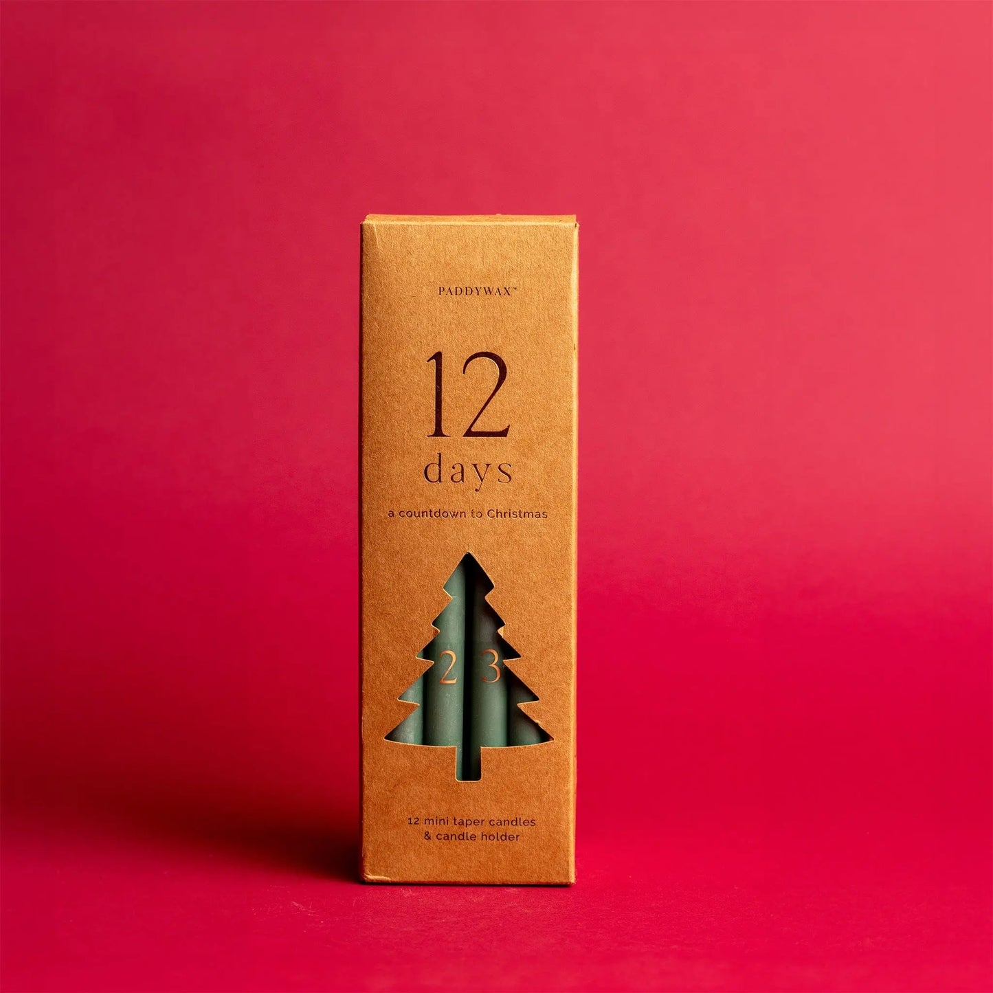 Cypress + Fir Taper 12 Days of Christmas Countdown Candle Set on red background