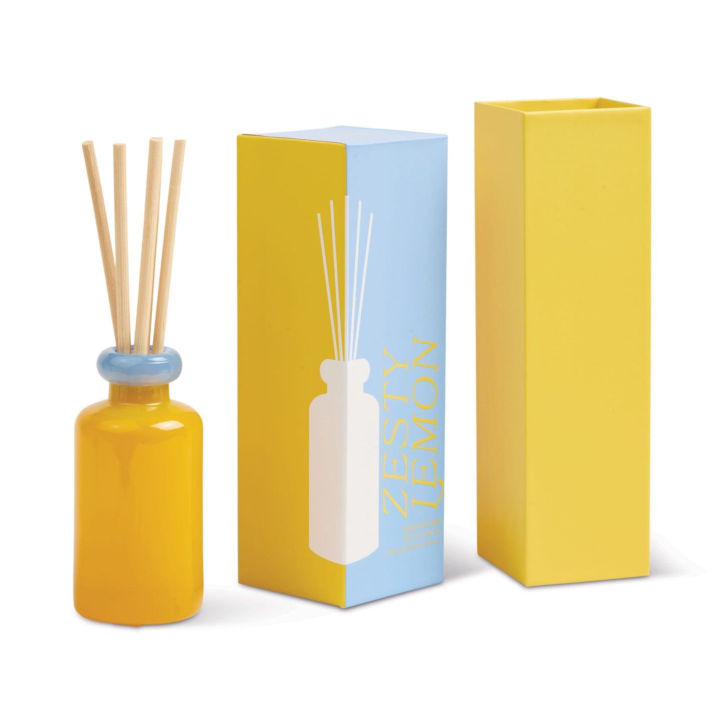 The Zesty Lemon - Stack 3.2 oz Diffuser, featuring a yellow lemon scent and wooden sticks, is displayed beside vibrant blue/yellow and solid yellow boxes—a lively addition to any modern home fragrance collection.