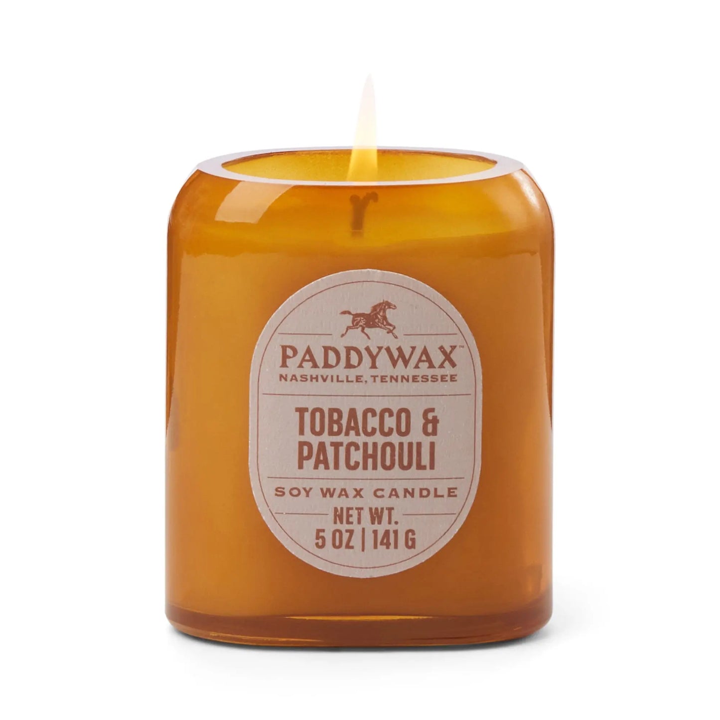 The Vista 5 oz Candle - Tobacco + Patchouli features a brown glass design, adding modern decor while filling your space with a luxurious fragrance.