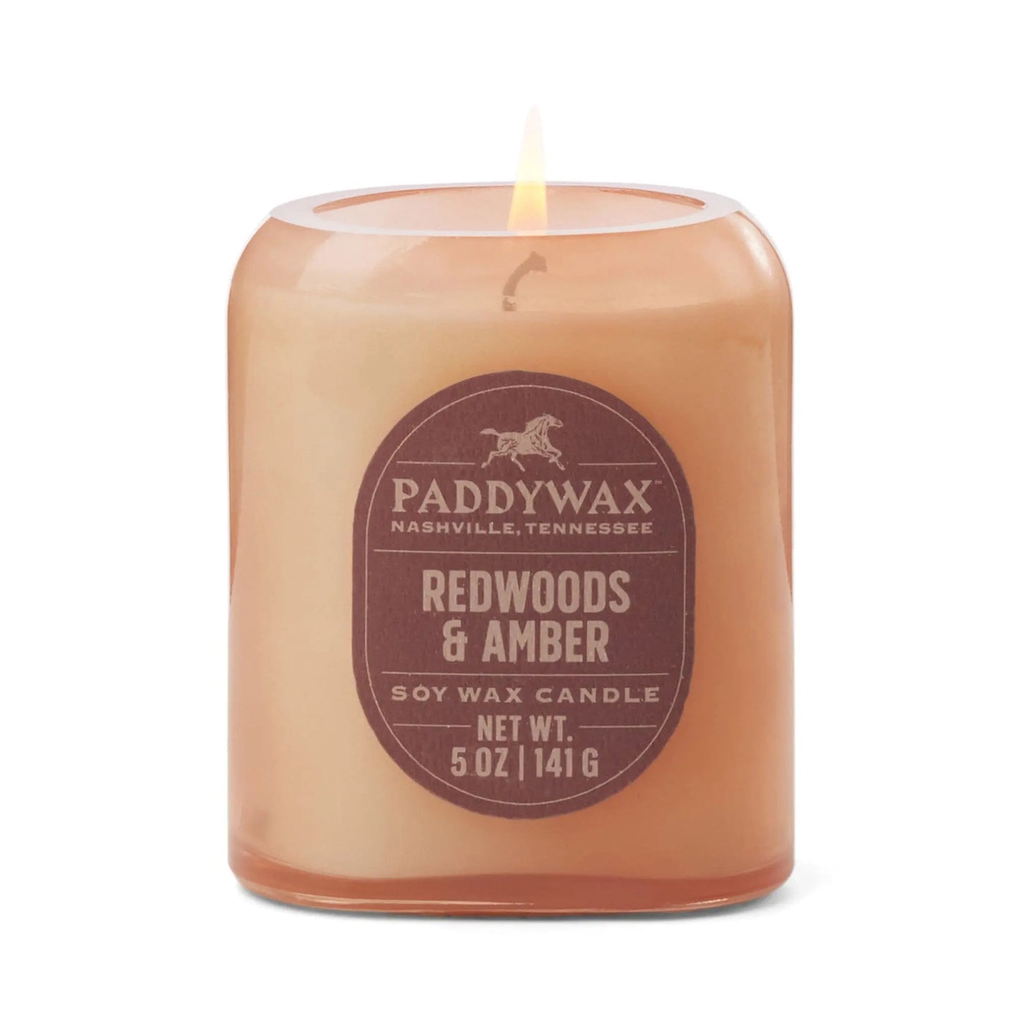 The Vista 5 oz Candle - Redwoods & Amber fills any room with a luxurious scent and adds modern style, all in a brown glass jar with a net weight of 141 g.