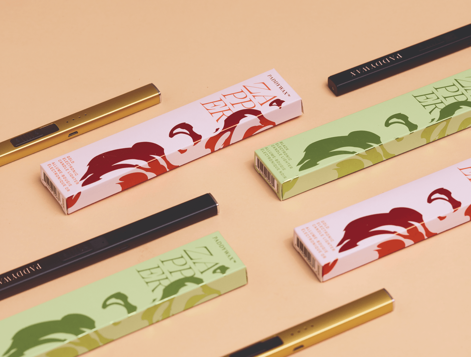 Several vape pens and colorful rectangular vape cartridge boxes are arranged diagonally on a light peach surface.