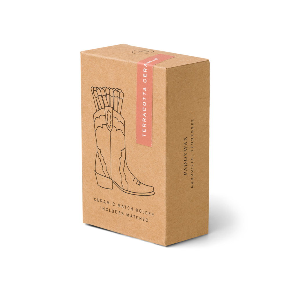 brown box with cowboy boot match holder outlined on the front
