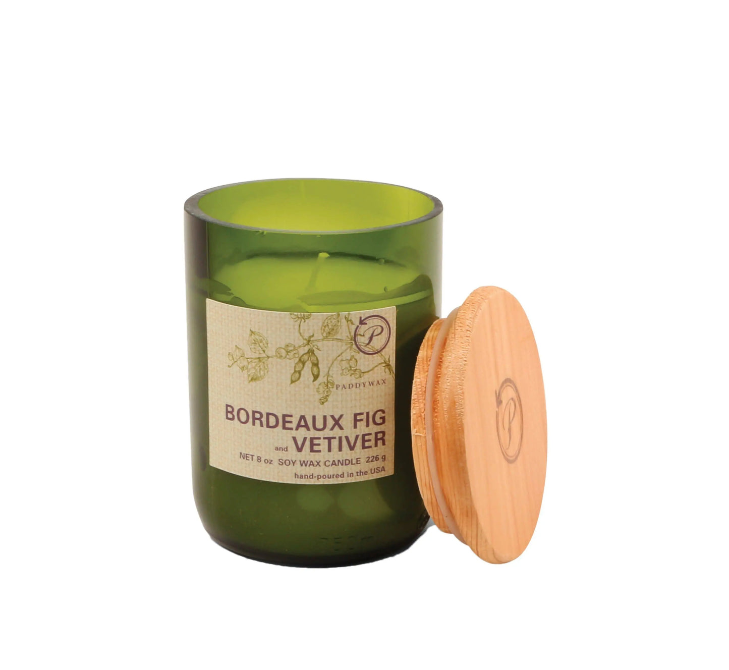 Candle in an 8 oz green glass vessel with a beige label and a wooden lid