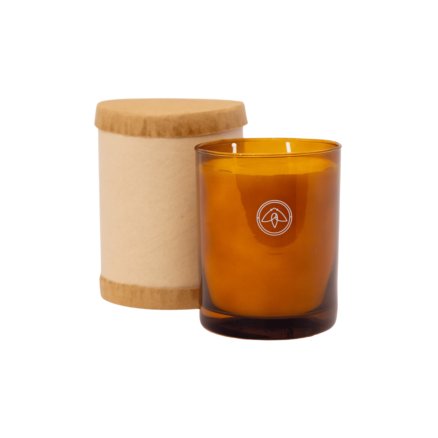 Glow candle next to packaging it arrives in