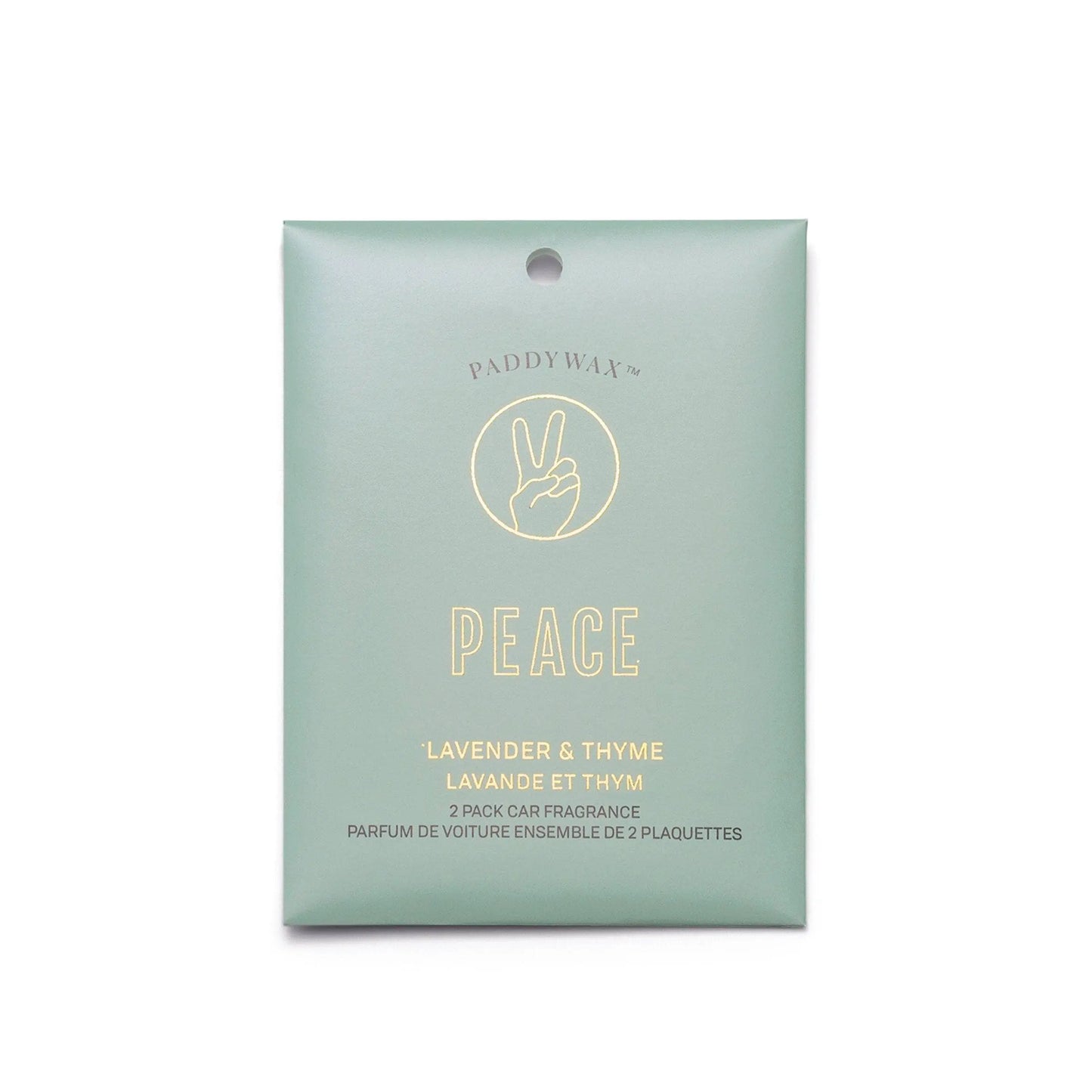 A green Impressions Car Fragrance - Lavender + Thyme Peace package shows a peace sign hand and contains a 2-pack of car fragrances.
