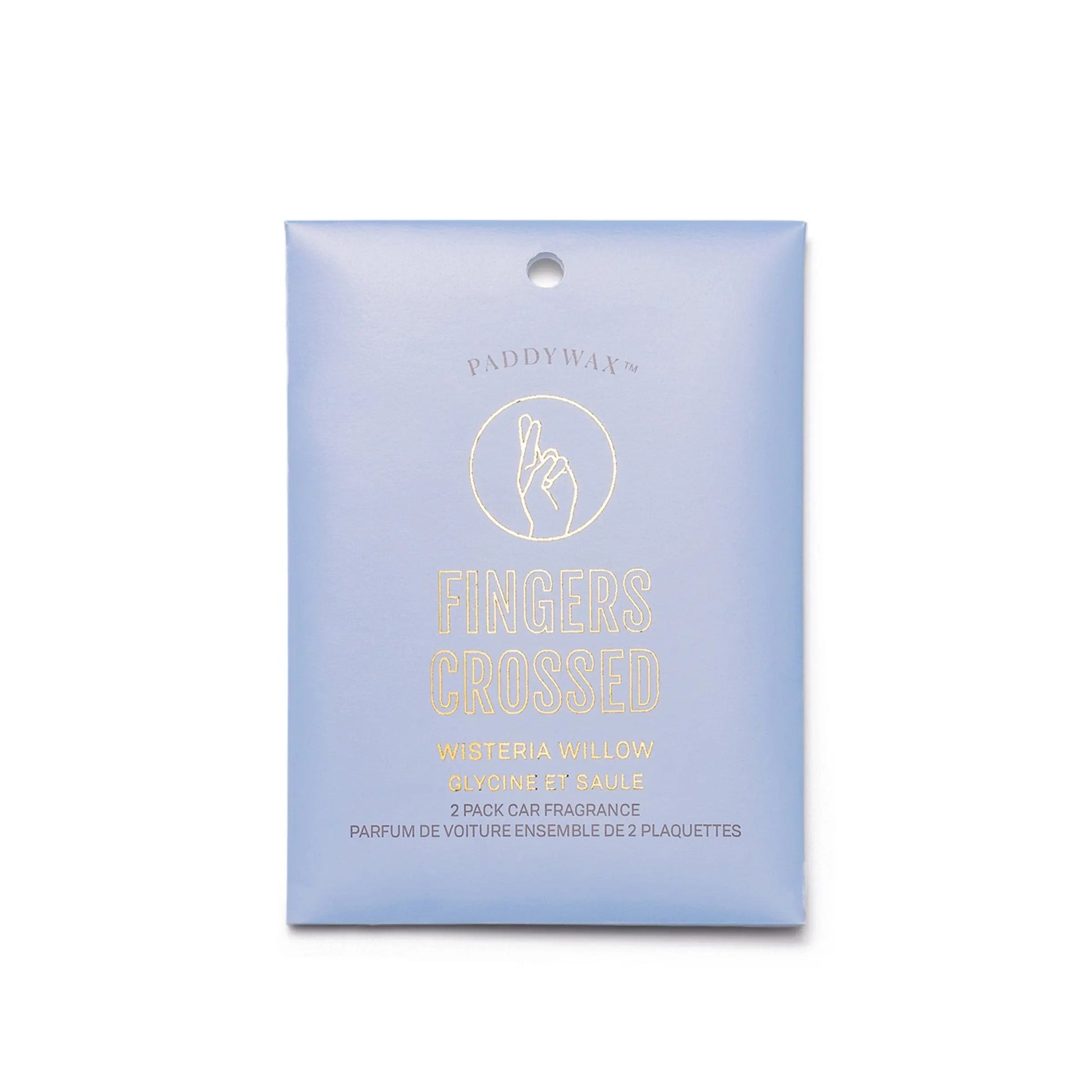 The Impressions Car Fragrance - Wisteria + Willow Fingers Crossed features a light blue packet with gold text and a crossed fingers design, adding elegance and fresh scent to your car on the go.