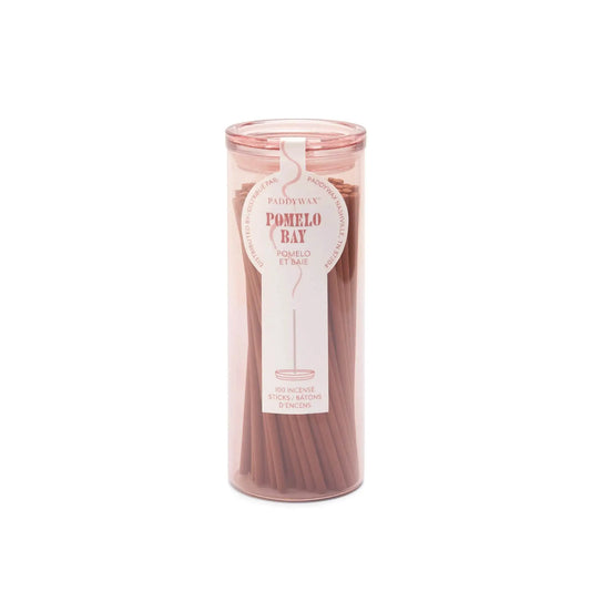 Pink glass cylinder with white label holding 100 incense sticks for flameless fragrance;
