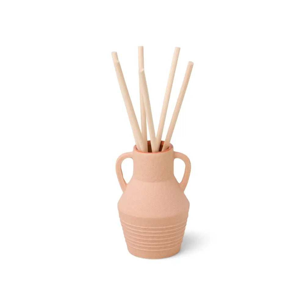 The Santorini 4 fl oz. Diffuser - Black Fig & Olive features a small terracotta vase with two handles and five light wooden sticks, serving as a chic fragrance diffuser against a plain white background.