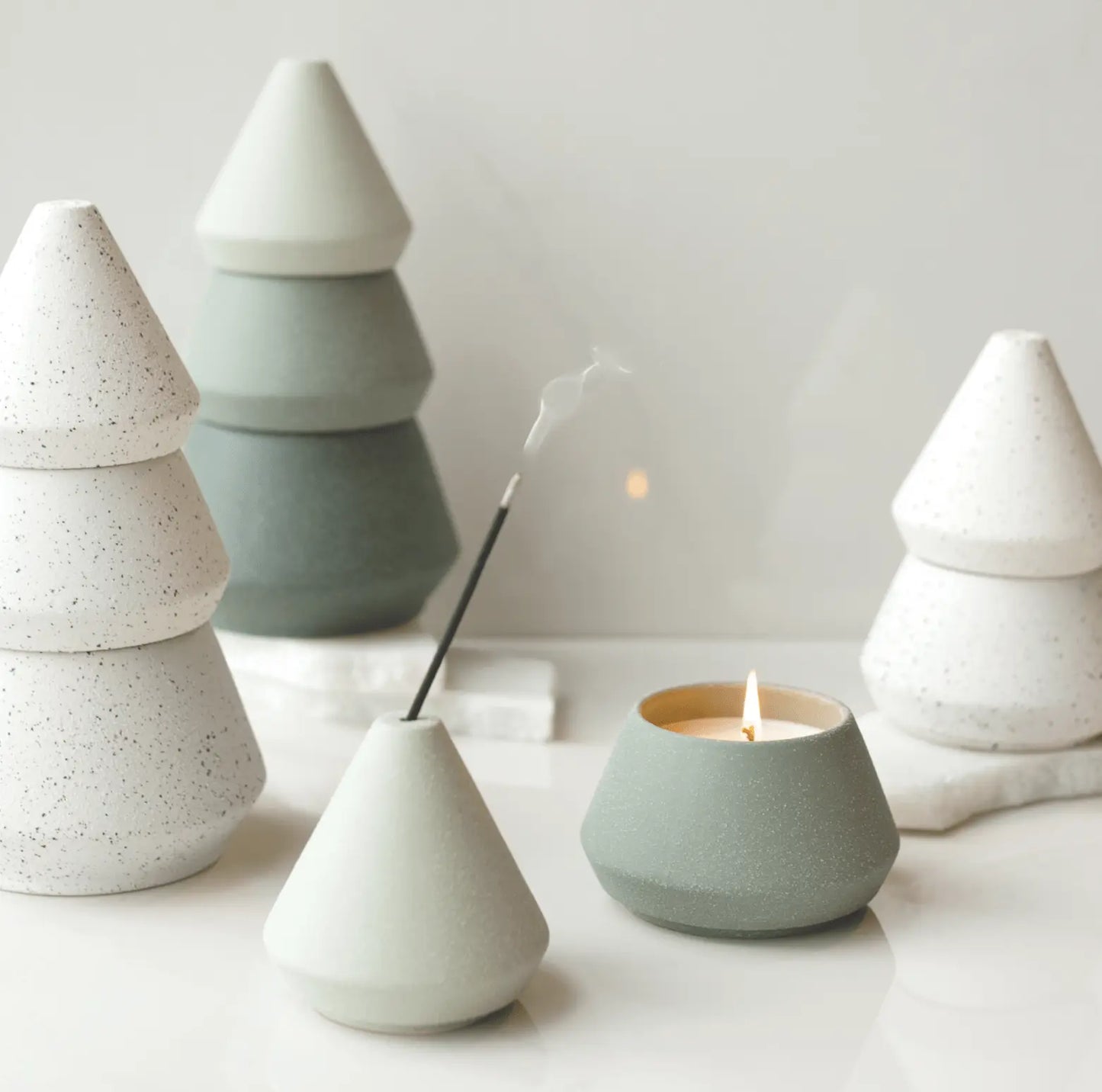 Large White Tree Stack with incense and a candle burning