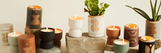 Collection of form candles close up on a rock background