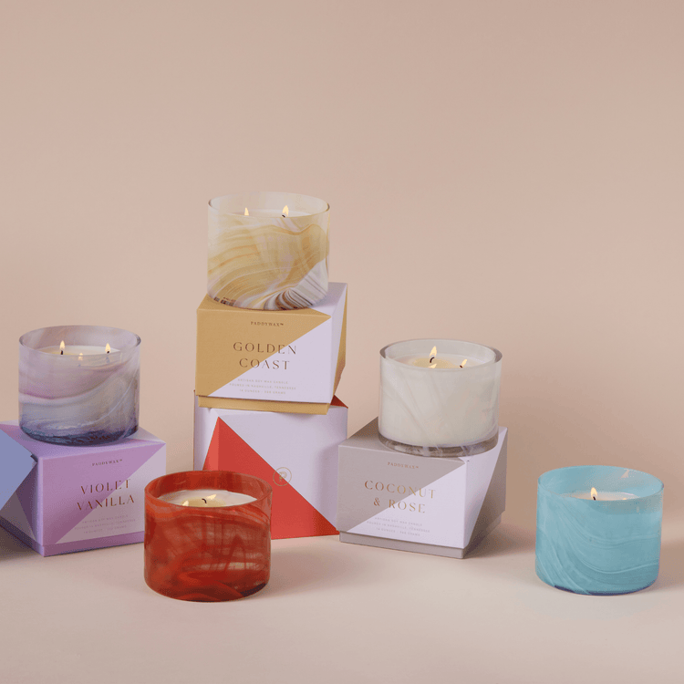 Whirl candles arranged with gift boxes