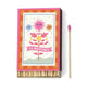 A Dopo Sun - 75ct Boxed Matches features vibrant floral and celestial cover art. Includes 75 safety matches, each with a pink tip. Great for collectors of A dopo matchboxes or as a stylish tabletop accent.