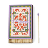 A Dopo Jungle - 75ct Boxed Matches features a decorative box with red monkeys and floral designs, plus purple-tipped safety matches—perfect for lighting your A Dopo candle after Mediterranean travels.
