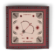 A square matchbox featuring a bow and arrow illustration, red and black border, and labeled Bow & Arrow - Black Matches—contains 100 matches, perfect for lighting candles easily.