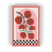 The A Dopo "Tomato Vine" 75ct Boxed Matches feature a tomato vine illustration, a banner stating 75 MATCHES, and a black-and-white checkerboard border, evoking Mediterranean travel and classic safety matchbox style.