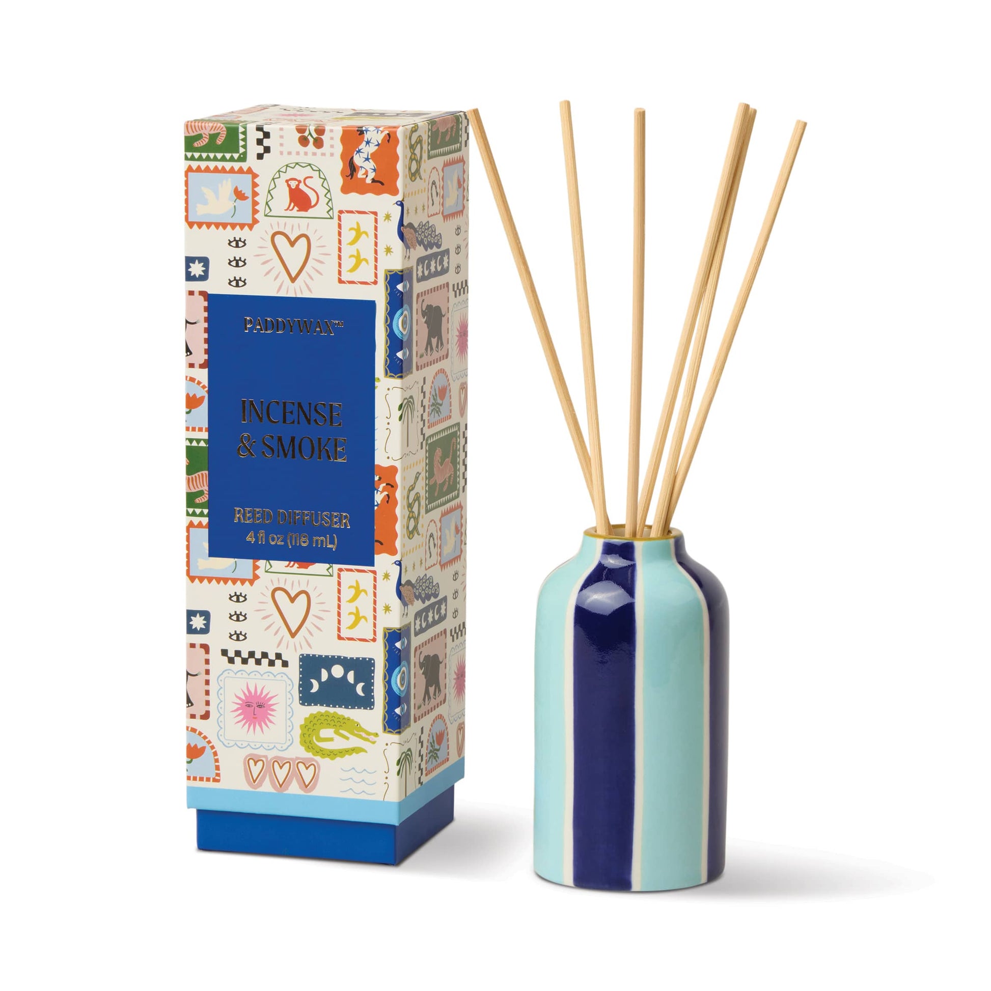 A striped blue and white ceramic reed diffuser with wooden sticks sits beside a colorful box labeled "Incense & Smoke - A Dopo 4 oz Diffuser.