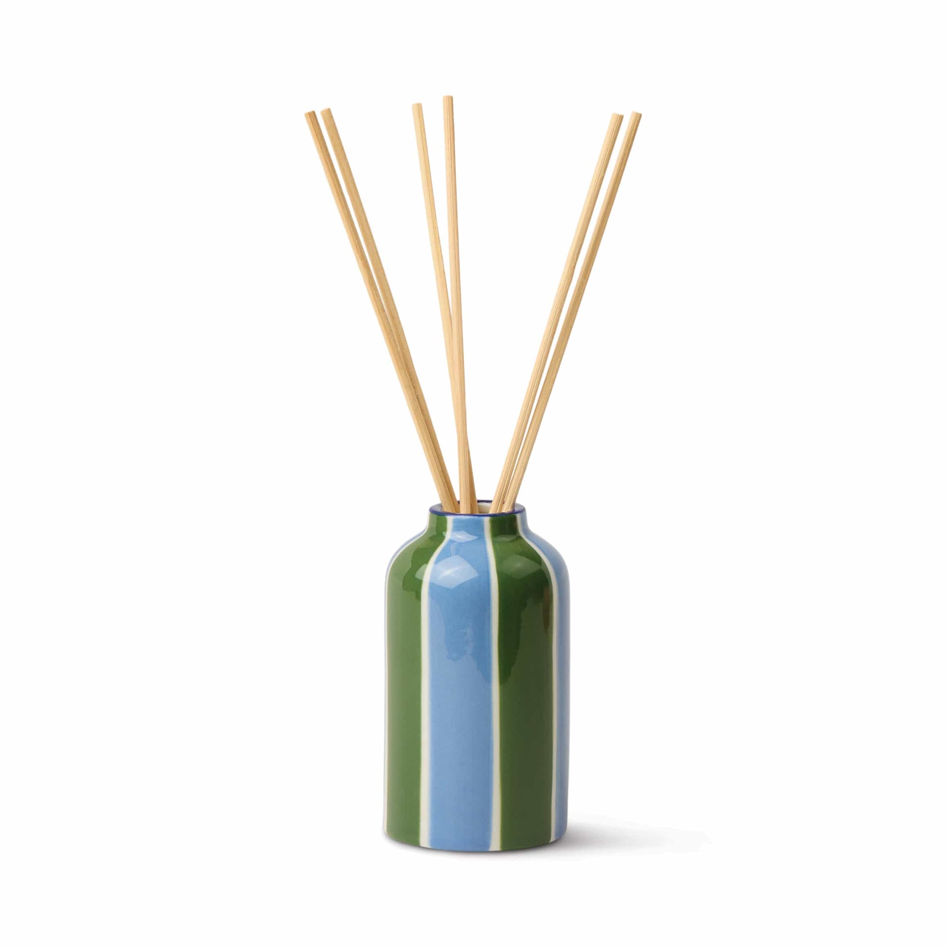 The Misted Lime - A Dopo 4 oz Diffuser features a green and blue ceramic vase with several long, thin reeds, perfect for diffusing fragrance, displayed against a plain white background.