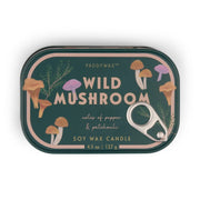The Wild Mushroom - Bistro Tin 4.5 oz Candle comes in a dark green rectangular tin with mushroom and leaf illustrations, a metal pull tab, and features a pepper & patchouli scent in soy wax.