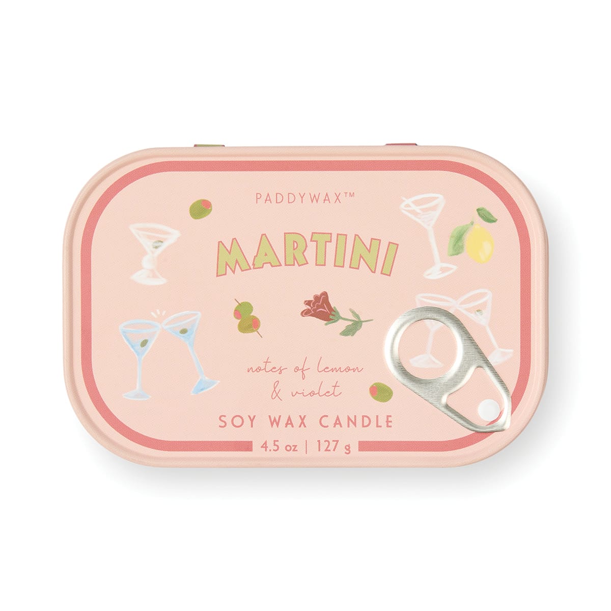 A pink tin labeled “Martini - Bistro 4.5 oz Tin Candle,” featuring illustrations of cocktail glasses, lemon, and olives. The text highlights notes of lemon and violet and describes the candle as a soy wax blend, 4.5 oz / 127 g. The lid includes a convenient pull-tab for easy opening.