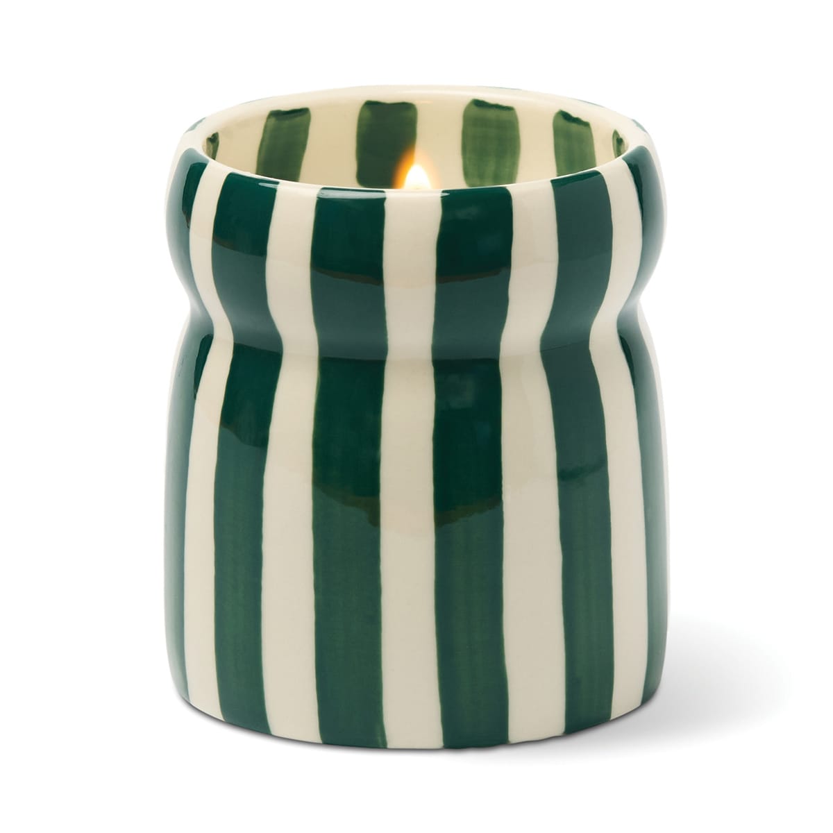 The Isla Fresca - Cabana 6.5 oz Candle is a ceramic candle holder with vertical green and white stripes, holding a lit candle.