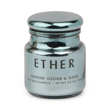 A metallic blue electroplated glass jar labeled Sea Salt & Sage - Chroma Candle 2.5 oz is photographed with its matching lid against a white background.