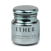 A metallic blue electroplated glass jar labeled Sea Salt & Sage - Chroma Candle 2.5 oz is photographed with its matching lid against a white background.