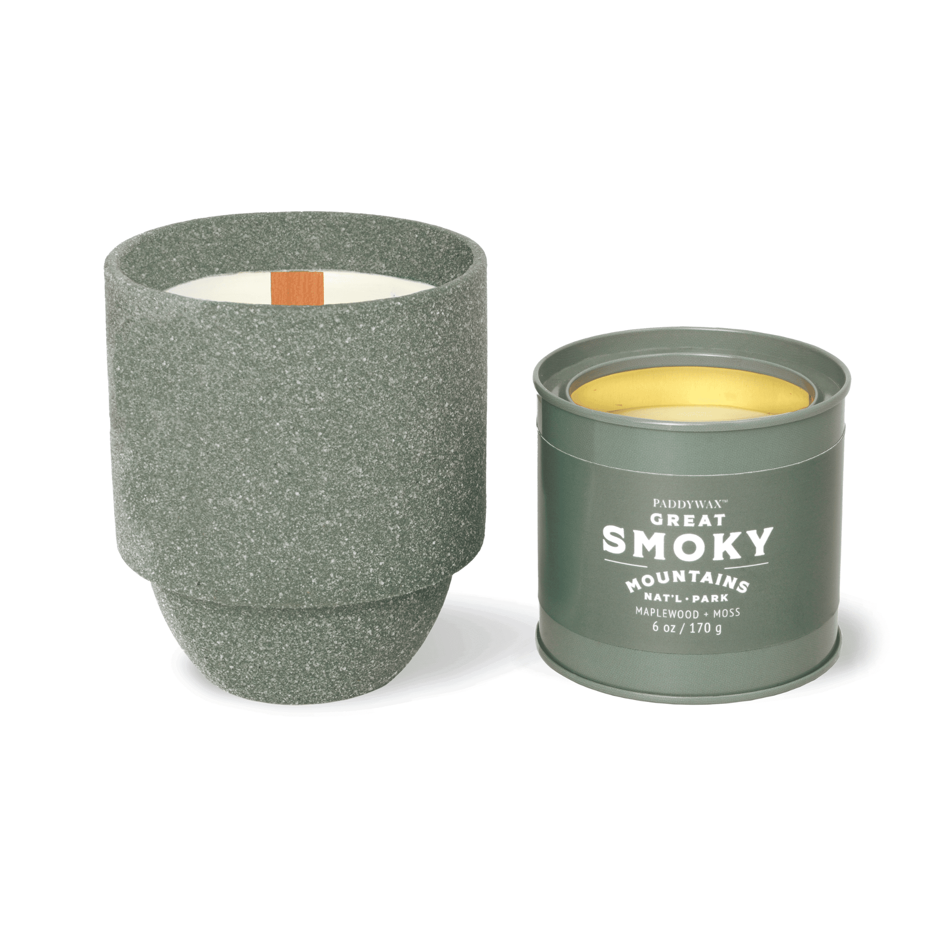 Parks 6oz Candle - Maplewood + Moss candle on a white background next to another Parks Collection candle.
