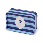 A rectangular tin candle container with blue and navy stripes labeled "Incense & Smoke - A Dopo 6.5 oz Tin Candle"—a perfect Mediterranean-inspired addition for your space.