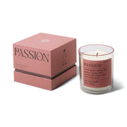 A pink "Passion" box sits beside a glass Saffron Rose "Passion" Mood Collection 8 oz candle, both featuring matching labels and scent description.