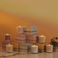 The mood candle collection on a marble table. 