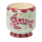 A hand-painted ceramic cup with red and pink koi fish, stars, and coral designs on a light green background, accented with red along the rim and base—perfect for holding your favorite Ocean Tide - A Dopo 8 oz Candle or sea salt candle.