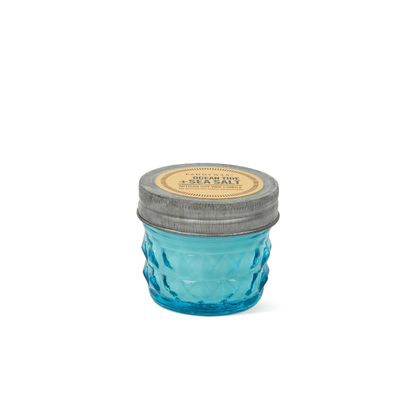 Ocean Tide & Sea Salt - Relish 3 oz Candle in a blue glass jar with a metal lid.