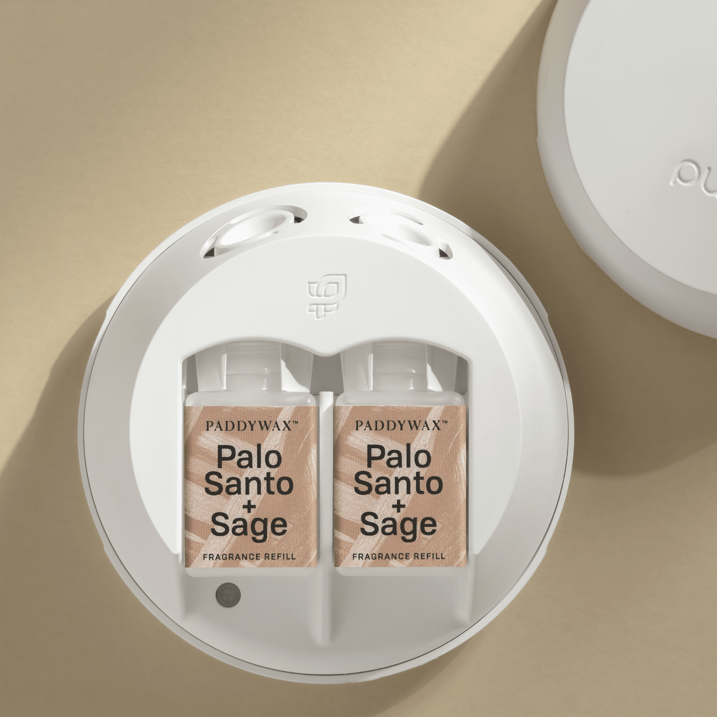 Paddywax Palo Santo + Sage fragrance refills for Pura in a Pura device