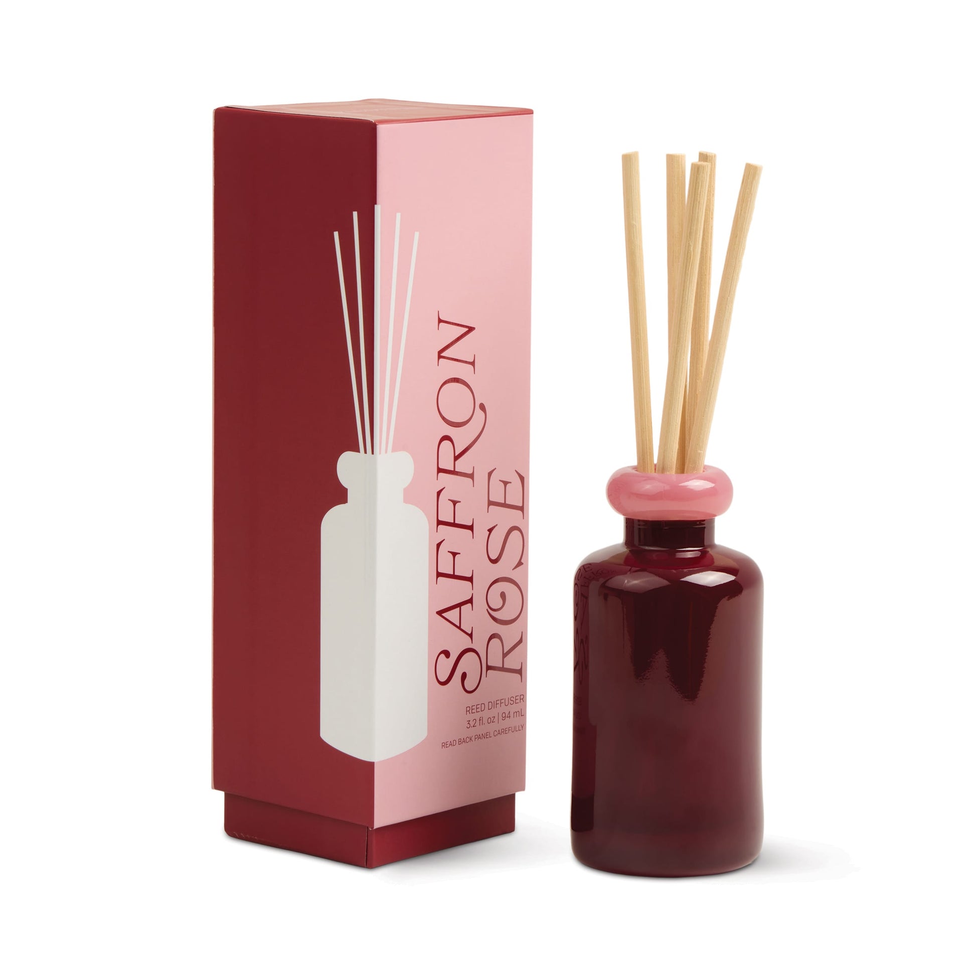 The Saffron Rose - Stack 3.2 oz Diffuser comes in a red glass bottle with a pink top and wooden reeds, displayed next to its matching box decorated with a white bottle illustration for modern, continuous fragrance.